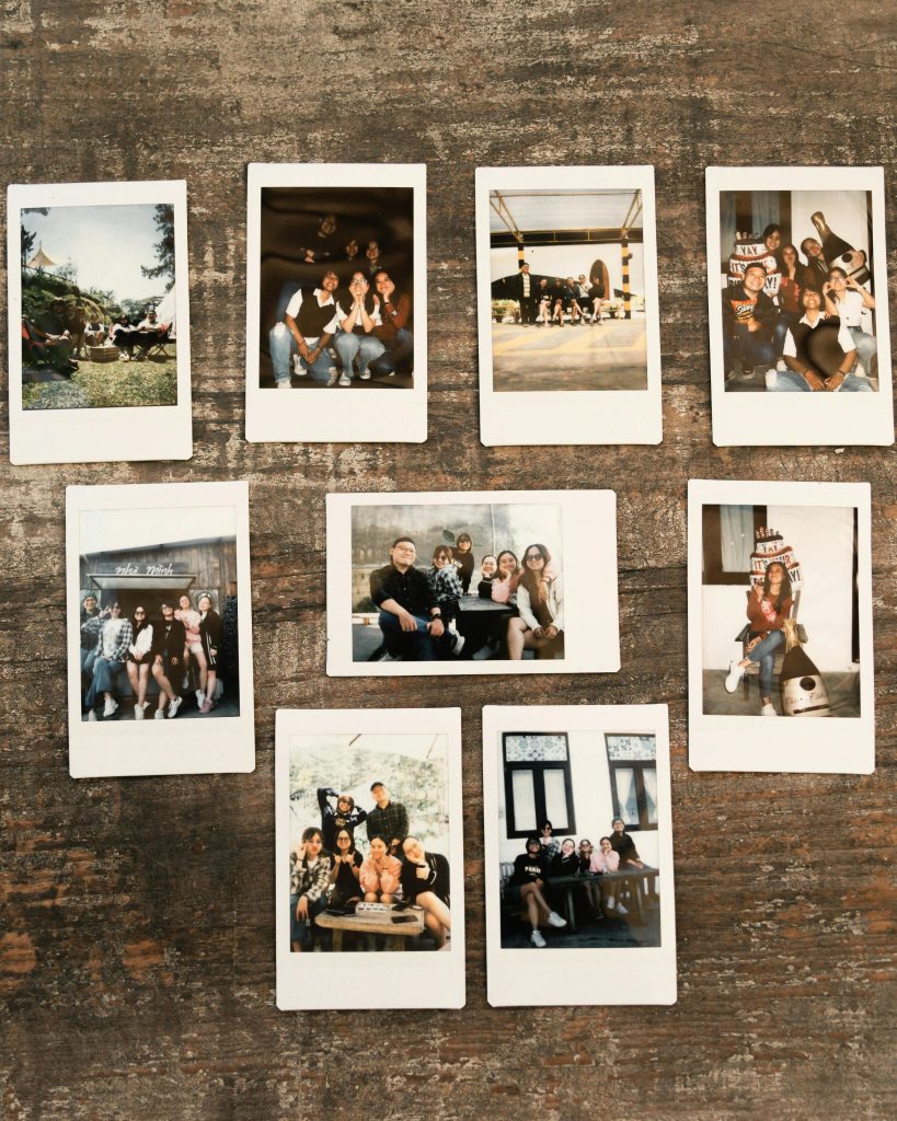 Nine Polaroid photos capturing candid moments with friends, showcasing a warm, vintage vibe.